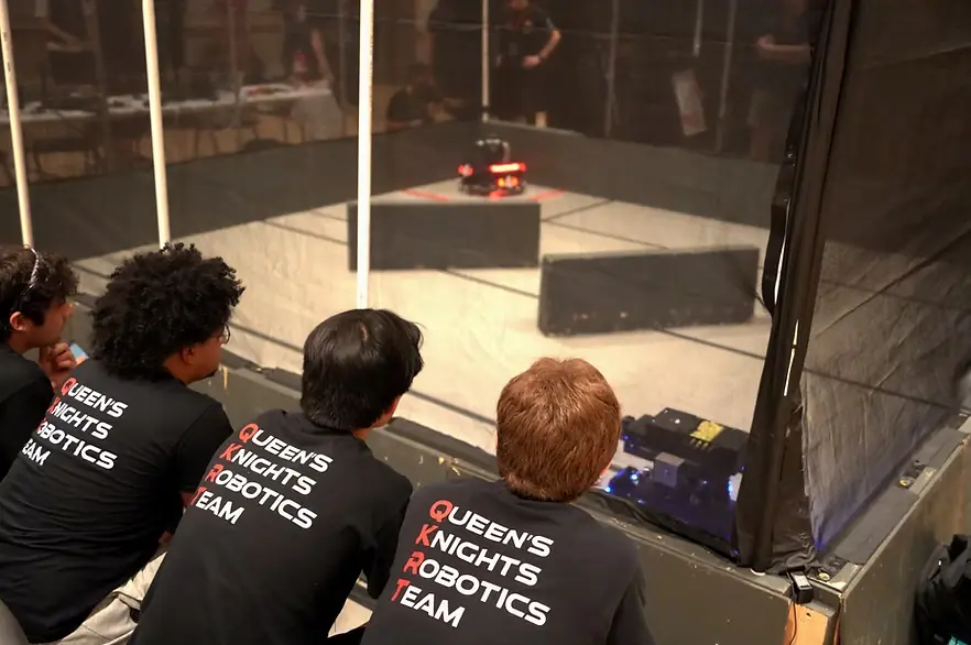 QKRT members watching a RoboMaster match
